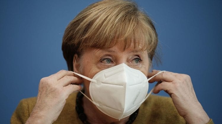 Merkel anunță mai multe restricții pentru Germania. „Practic avem o nouă pandemie”
