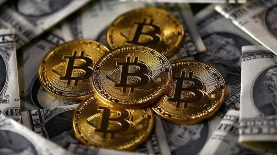 Preț record pentru Bitcoin, depășind orice nivel – peste 66 000 de dolari