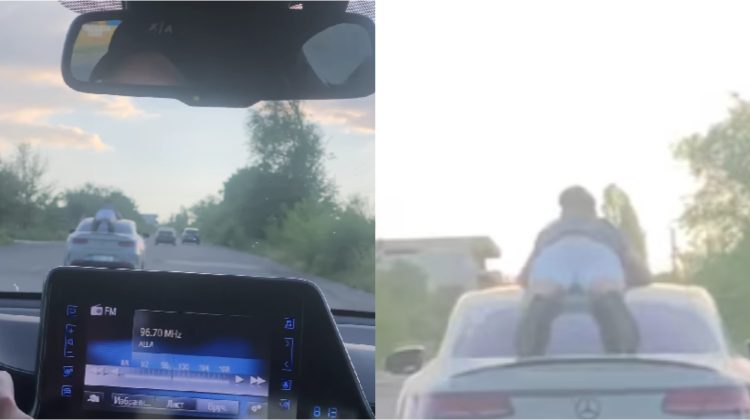 Se putea produce o tragedie! VIDEO șocant cu un bărbat care stă pe acoperișul mașinii în plin trafic