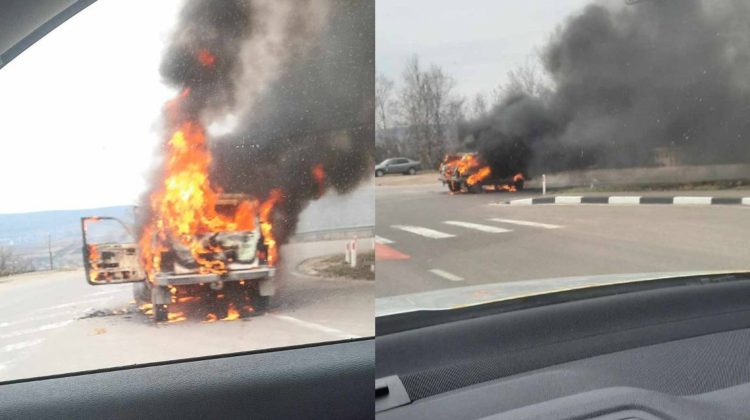FOTO Un automobil a fost „înghițit” de flăcări și fum, în raionul Nisporeni