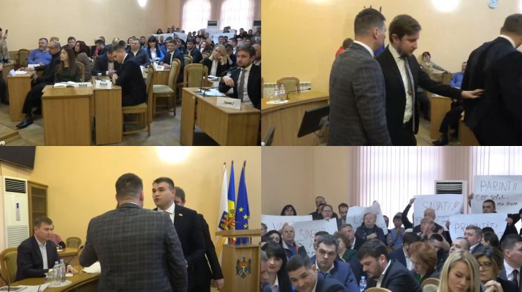 VIDEO Haos la prima ședință a Consiliului Municipal Chișinău. Oameni cu pancarte au scandat „Rușine”