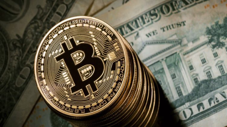 Bitcoin a depăşit pentru prima dată pragul de 100.000 de dolari