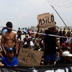 Sute de migranți marocani au protestat în orașul spaniol Ceuta și cer autorităților să le permită să rămână