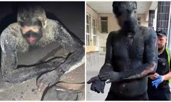 VIDEO Un ucrainean s-a acoperit cu smoală ca să jefuiască un magazin: Polițiștii au avut nevoie de 5 ore ca să-l curețe