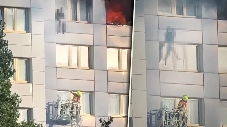 Momentul dramatic în care o femeie sare de la etajul 11, în braţele pompierului, pentru a scăpa de incendiu