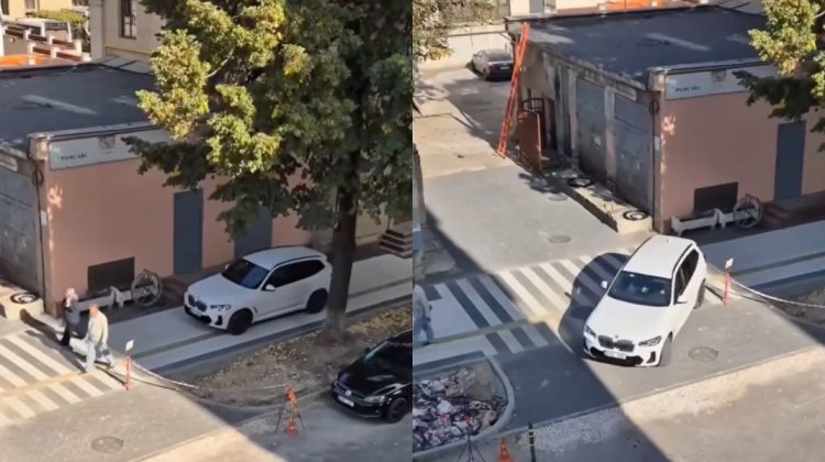 VIDEO Cu BMW-ul pe trotuar, printre pietoni. O șoferiță a fost documentată de poliție